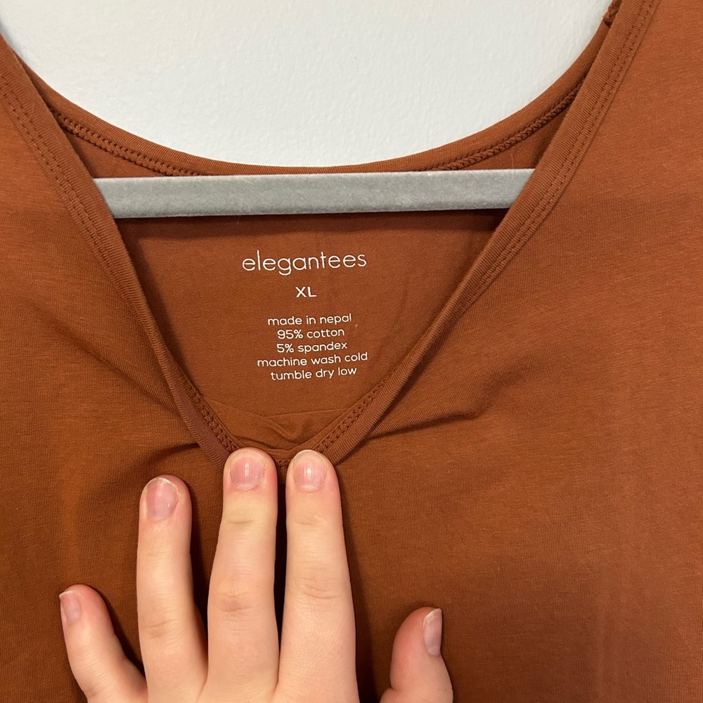 Elegantees RePosh! Burnt Orange flutter back top. Fair Trade